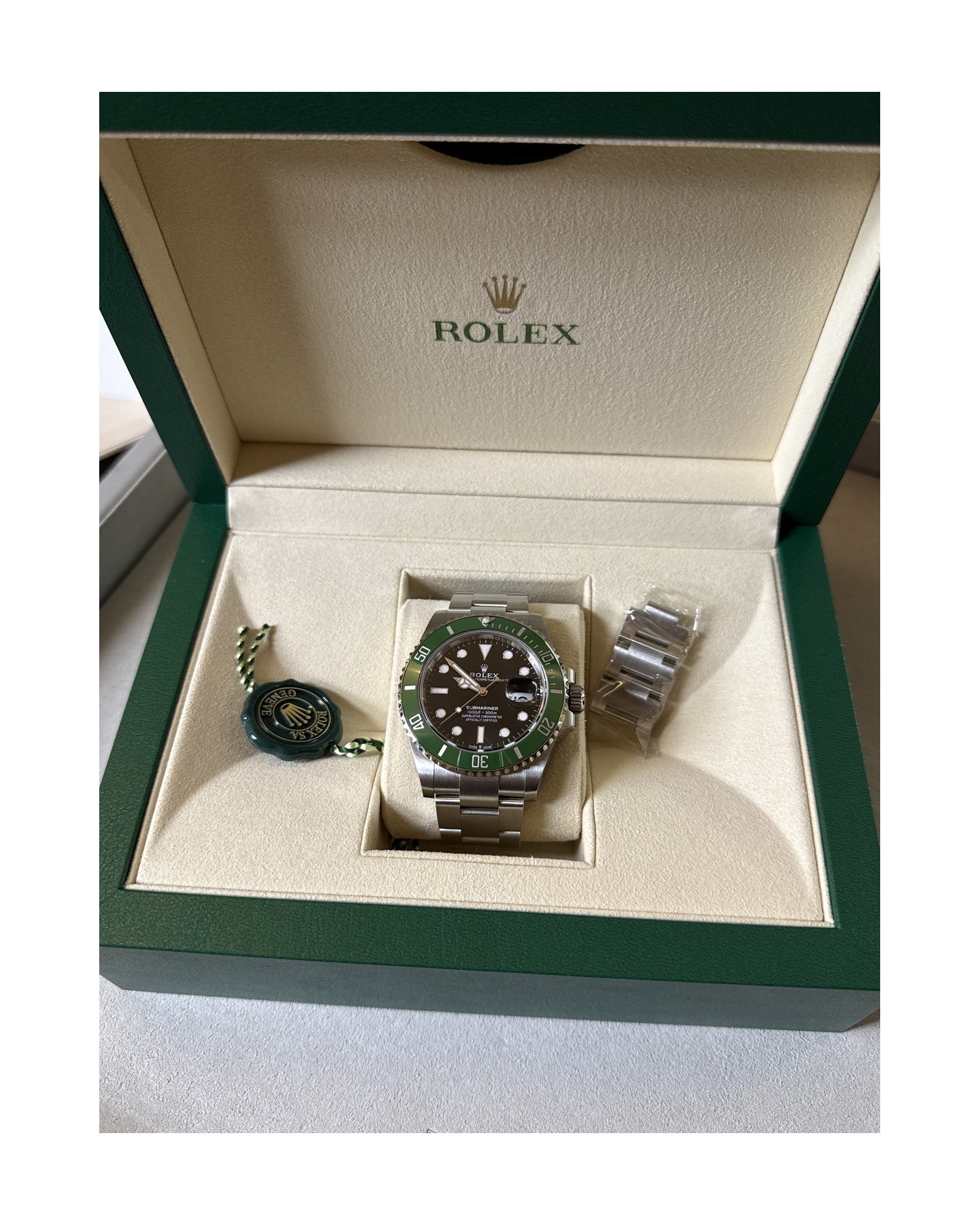 Rolex Submariner 126610LV in original Rolex box with hangtag and full set